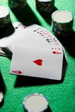 bdgacor mobile app showing live baccarat table and sportsbook betting slip side by side